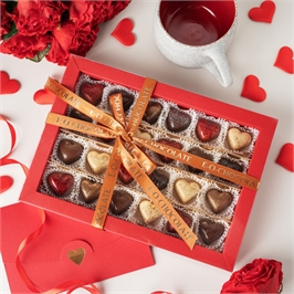 {{productViewItem.photos[photoViewList.activeNavIndex].Alt || productViewItem.photos[photoViewList.activeNavIndex].Description || 'Набор из 24 конфет ручной работы из коллекции 2026'}}