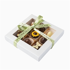 {{productViewItem.photos[photoViewList.activeNavIndex].Alt || productViewItem.photos[photoViewList.activeNavIndex].Description || 'Набор из 9 конфет «Пасха 2026»'}}